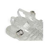 Die Schuhe lassen sich mit einer nickelfreien Metallschnalle und Druckknopf verschliessen, so dass sie auch kleinere Kinder selbstständig an- und ausziehen können.